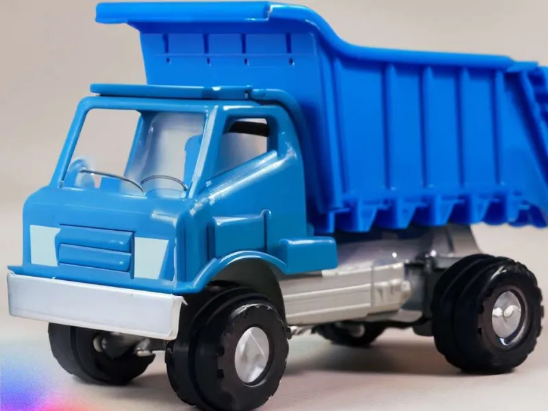a blue colored toy truck